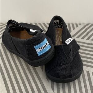 Black Baby Toms shoes